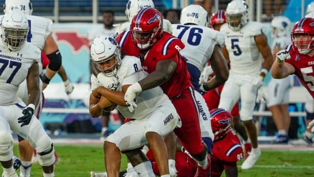Florida Atlantic defensive tackle Evan Anderson (8) sacks the Monmouth quarterback in the second quarter at FAU Stadium on Saturday, September 2, 2023, in Boca Raton, FL.  